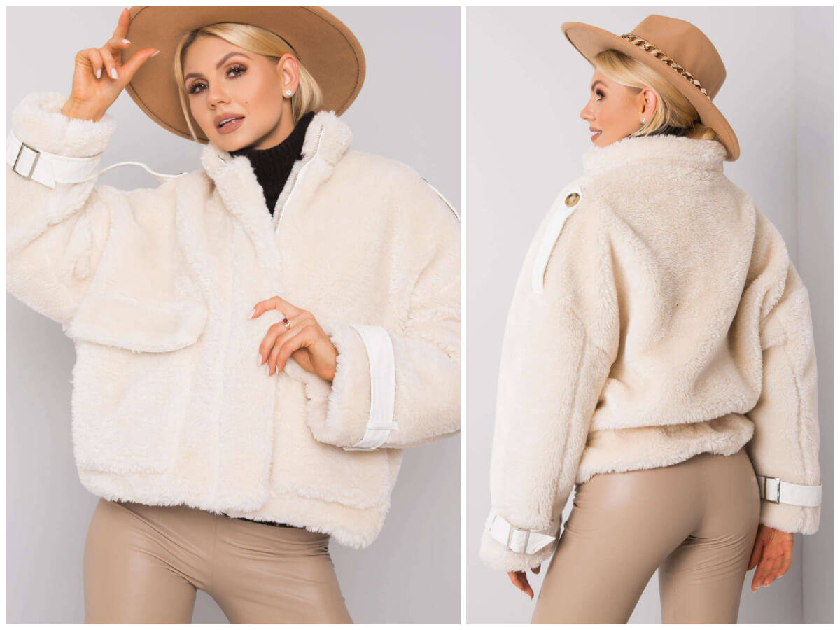 Modelka pozuje w stylizacji promując zimowe kurtki damskie hurtowo