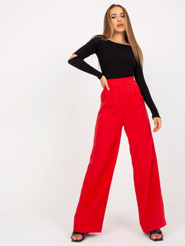 Czerwone damskie spodnie z materiału z szeroką nogawką