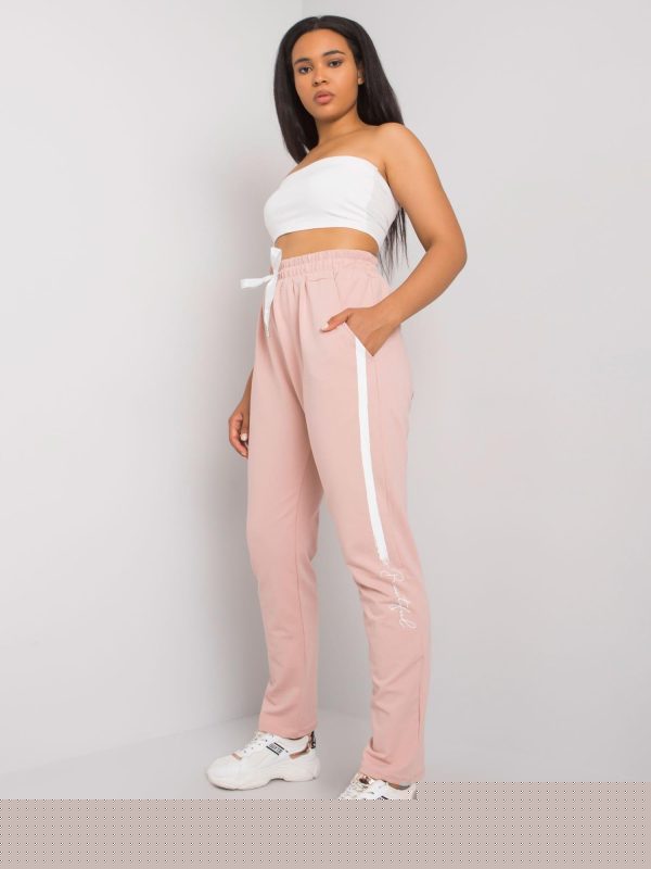 Brudnoróżowe spodnie dresowe plus size z nadrukiem Abelia