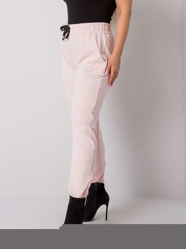 Jasnoróżowe spodnie plus size Judith