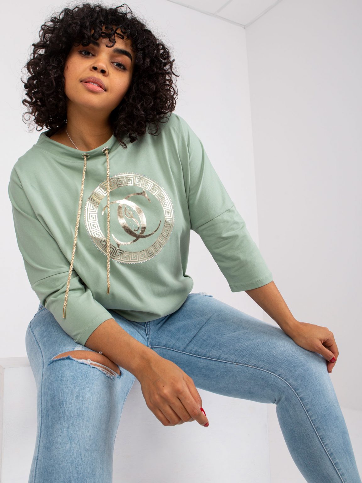 Pistacjowa bluzka plus size z printem Terry