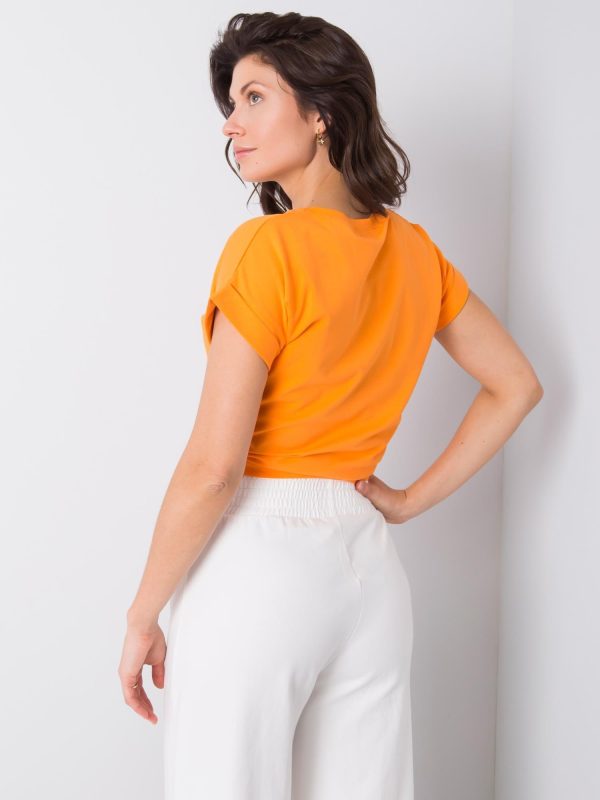 Pomarańczowy t-shirt z napisem Saniyah