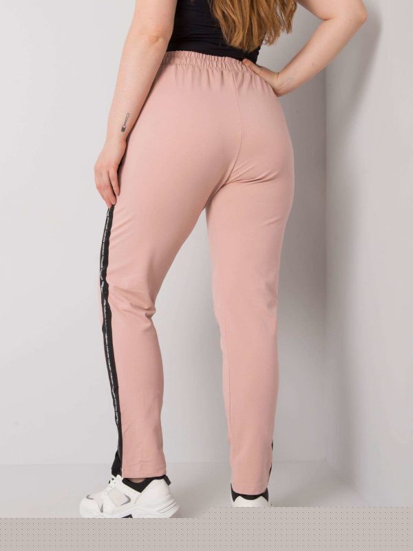Brudnoróżowe spodnie dresowe plus size z lampasami Felise