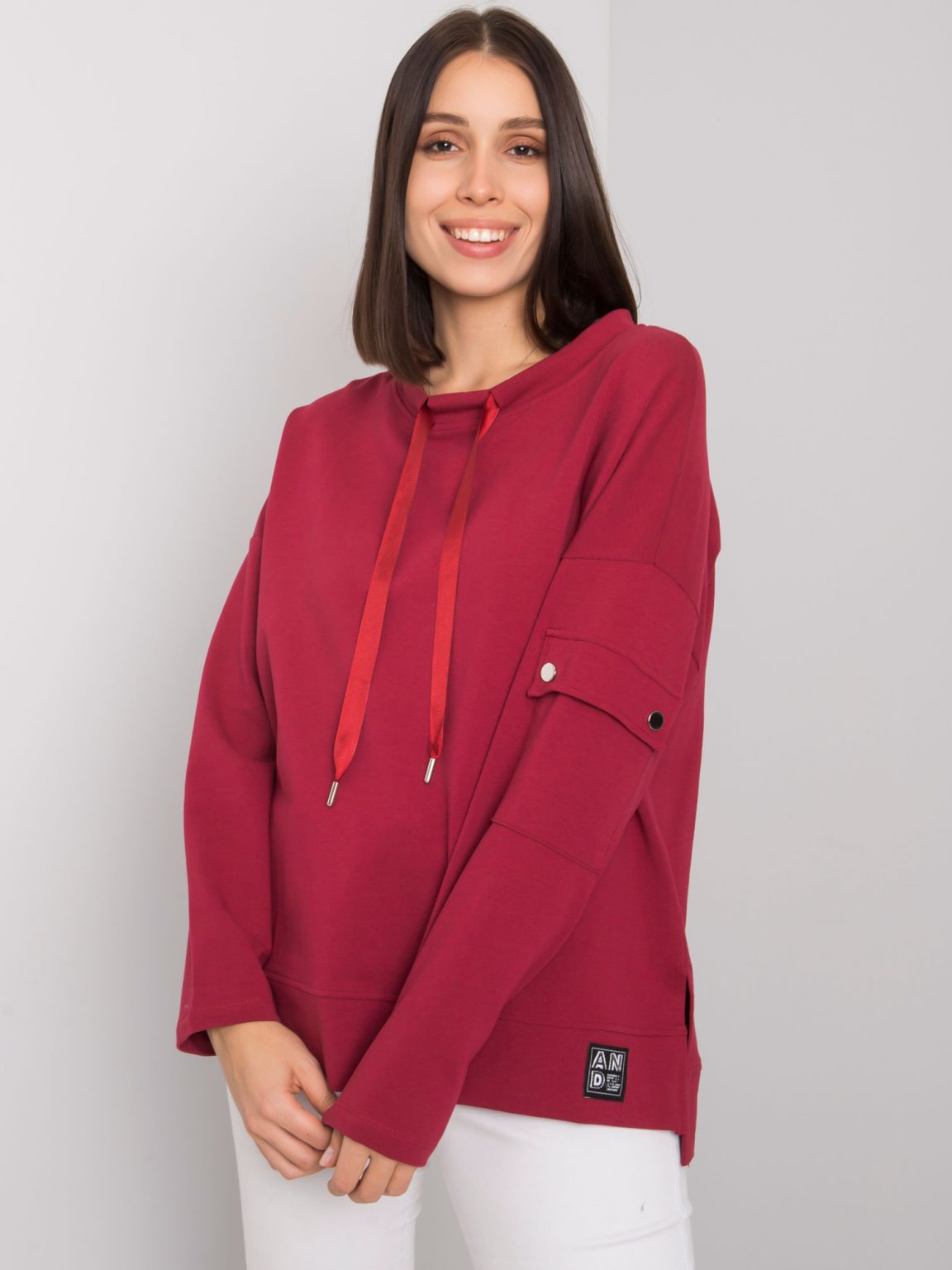 Bordowa bluzka plus size z kieszenią na rękawie Lunnara