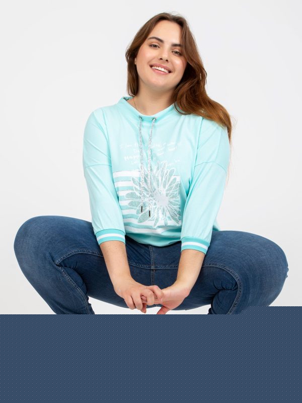Miętowa bawełniana bluzka plus size z aplikacją