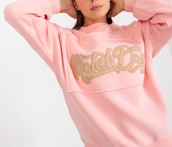 Hurtownia Jasnoróżowa dresowa bluza oversize bez kaptura
