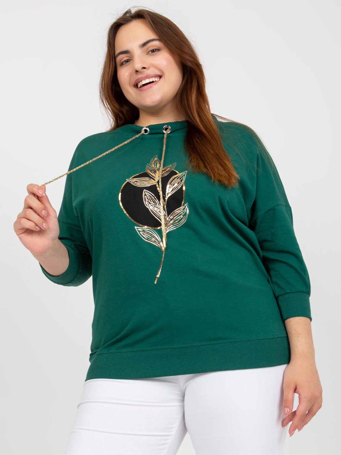 Hurtownia Ciemnozielona bluzka plus size z aplikacją