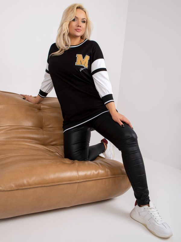 Hurtownia Czarna dresowa tunika plus size z naszywką