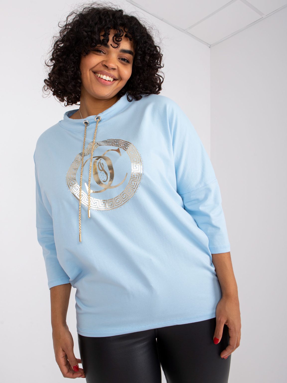 Hurtownia Jasnoniebieska bluzka plus size z nadrukiem Terry