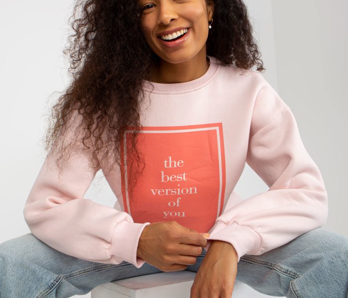 Hurtownia Jasnoróżowa dresowa bluza oversize z nadrukiem